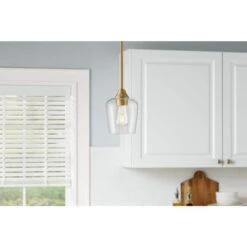 Pavlen 5.5 In. 1-Light Antique Brass Mini Pendant With Clear Glass Shade