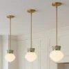 Lucy 1-Light Lacquered Brass Globe Pendant Light With Shade
